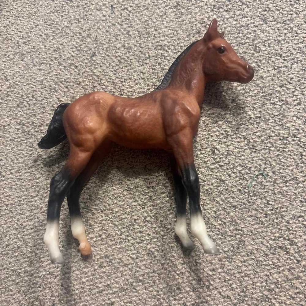 This is a vintage Breyer bay Quarter Horse foal model